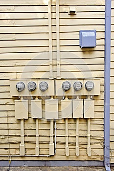 Electric Meters On Side of Old House