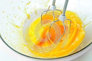 Electric Mixer Beaters Beating Eggs