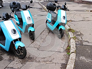 Electric mopeds on the street.