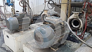 Electric motor on baseplate in pulp industial photo
