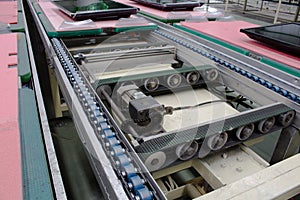 Electric motor and conveyor belt in factory