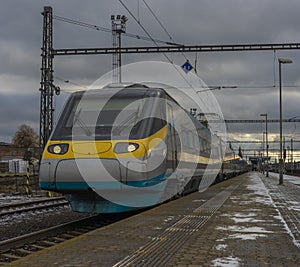 Electric multiple unit train in Plana u Marianskych Lazni station in evening