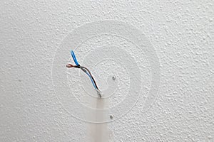 Electric plug in home improvement repair with seen cables . new electrical outlets in flat . Electrical wires, wiring, socket on