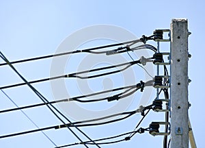 Electric pole on blue sky background