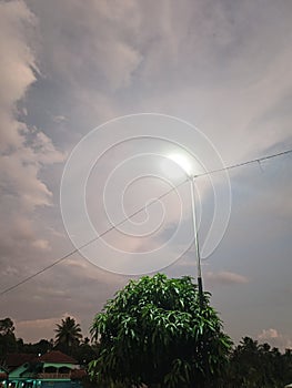 electric pole cables under the evening sky