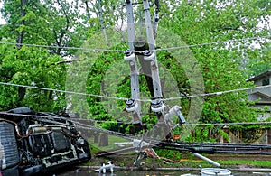 electric pole after hurricane damaged car turned over after accident