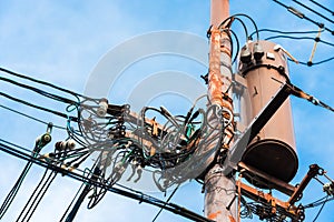 Electric pole with wires against the blue sky, Kyoto, Japan. Copy space for text.
