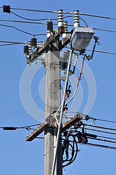 Electric pole with wires and isolators