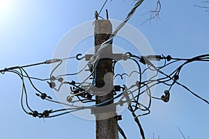 Electric pole with wires and power equipment