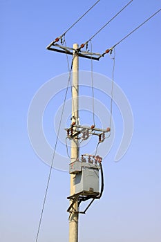 Electric poles under the blue sky