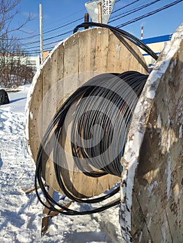 electric power cable of large cross-section wound on a cable drum. cable reel .wooden coil wire electric cable