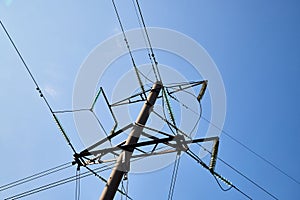 Electric power lines and wires with blue sky. Support of power lines in a nice day