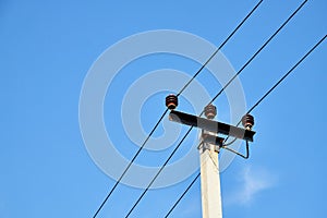 Electric power lines and wires with blue sky. Support of power lines in a nice day