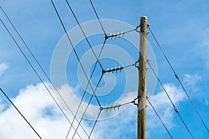 Electric power pole with insulators