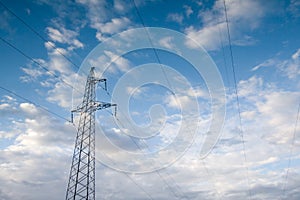 Electric power station lines, on the blue sky backing