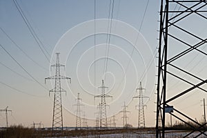 Electric power station lines, on the blue sky backing