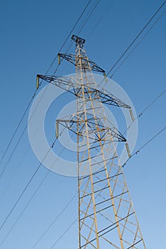 Electric power station lines, on the blue sky backing