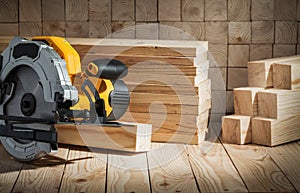 Electric power tool corded circular hand saw on wooden background