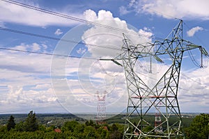 Electric Power Transmission Lines over trees.