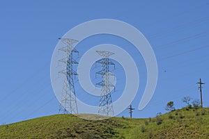 Electric power transmission tower in rural area  Electric power distribution infrastructure