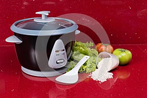 Electric rice cooker, in the kitchen red in modern home