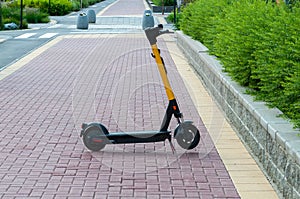 electric scooter near concrete wall
