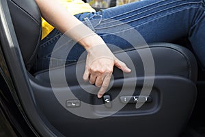 Electric seat adjustment of car photo