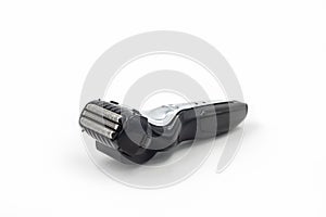 Electric shaver on white background