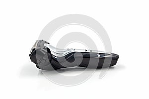 Electric shaver on white background