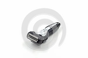 Electric shaver on white background