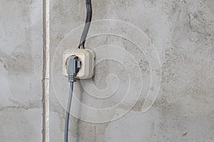 Electric sockets light works mounting and installation on plaster wall background. Professional installation of electrical outlets