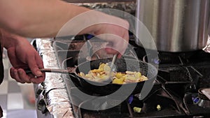 On electric stove pan frying potato mushrooms cooker prepares dinner