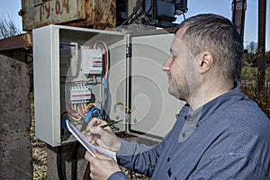 Electric substation, Technician Writing Reading Of electricity M