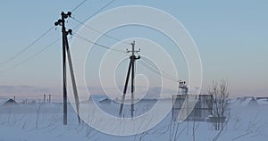 Electric substation transformer box in the winter foggy field