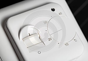 Electric thermostat for underfloor heating. Comfort temperature, macro