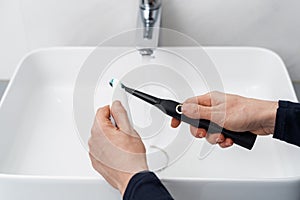 Electric toothbrush, dental and oral care concept