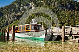 Electric tourist boats on beautiful lake Konigssee pier Berchtesgaden National Park Germany