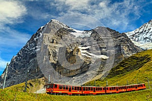 Electric tourist train and Eiger North face,Bernese Oberland,Switzerland