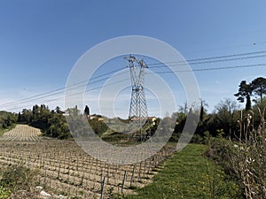 electric towerr in a meadow