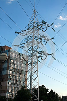 Electric towers with wires. Electric high voltage tower with electric line against clear blue sky
