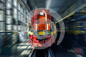 The electric train is going through the tunnel. railway. freightage