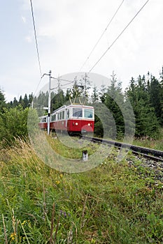 Electric train running on rails with gear, High Tatras, Slovakia