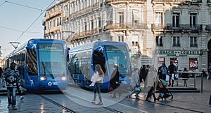 Electric tram stopped at Place de la Comedie in Montpellier