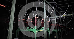 Electric tranformer substation inspected at night