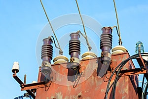 Electric transformer on blue sky background