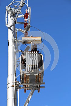 electric transformer and high voltage electrical cables and blue