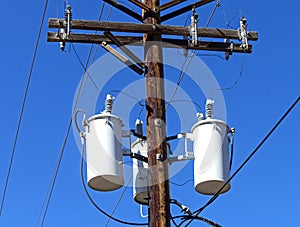 Electric transformers on pole