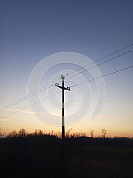 Electric transmission line at dusk