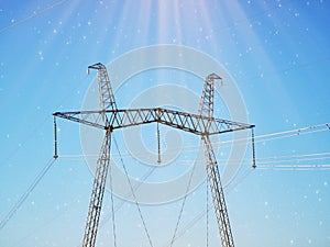 Electric transmission line. Power transmission pylon silhouette against blue sky at dusk. The concept of electrification