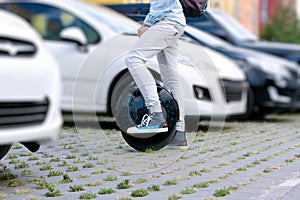 Electric transport compare to diesel fuel cars. Electric balancing unicycle